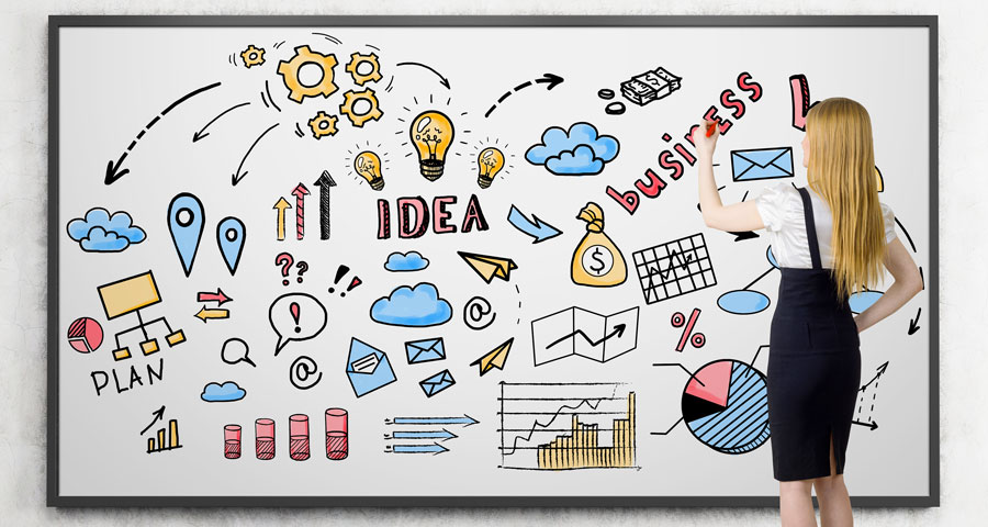Image pour l'article : pourquoi avoir un site internet du site Jdesign.fr ; une jeune femme blonde dessine des icons relatifs au business.